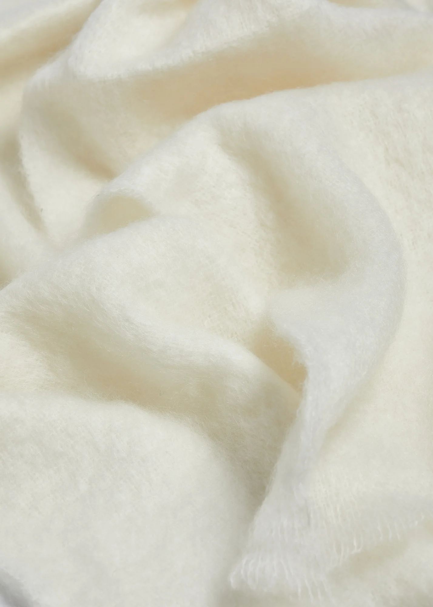 Weiche Foxford Decke aus Mohair und Wolle in hellen Naturtönen